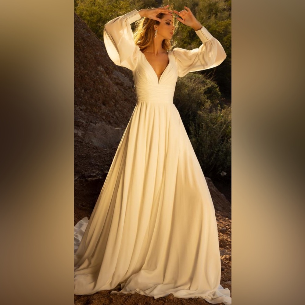 Romantic, Minimalist Ivory Chiffon A-line wedding dress with long sleeves.Size 8